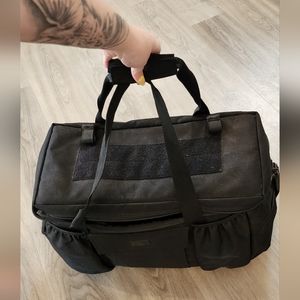 5.11 duty, military or everyday duffle bag with straps. Used lightly. No issues